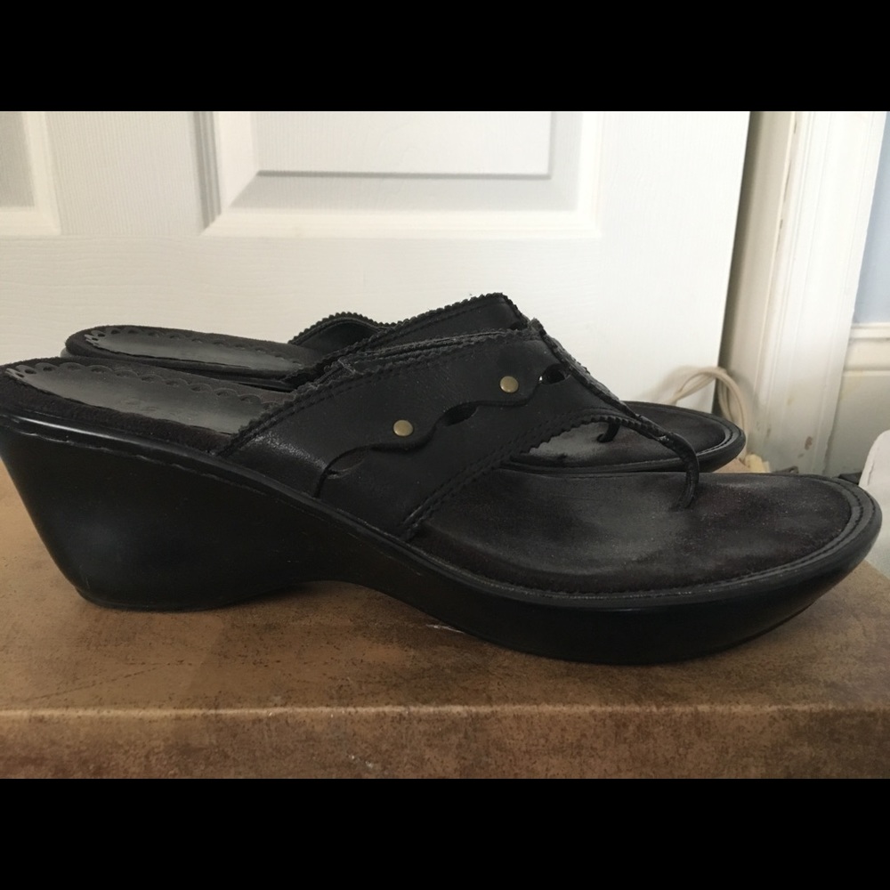 Black leather sandal wedge.